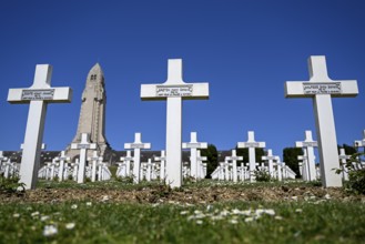 Cemetery of soldiers killed in the First World War, in the background the ossuary of Douaumont,