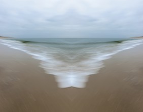 Mirrored picture, blurred, waves on Sylt North Sea beach, National Park Wadden Sea, Sylt, Hoernum,