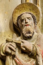 Detail of an apostle of a stone relief of a group of three, Severikirche in Erfurt, Thuringia,