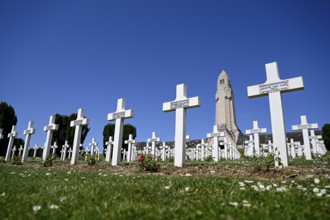 Cemetery of soldiers killed in the First World War, in the background the ossuary of Douaumont,