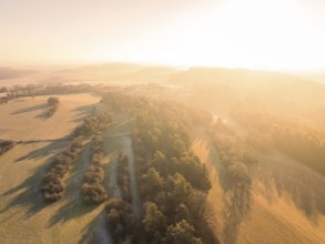 Sunrise over a wide landscape with long shadows and warm colours, Gechingen, district of Calw,