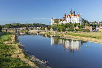 Albrechtsburg Castle and cathedral towers with reflection in the Elbe, Meissen, Saxony, Germany,