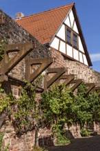 Reconstructed brackets made of concrete, support for battlements on town wall from the Middle Ages,