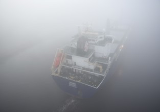 Cargo ship JAMNO sailing in fog in the Kiel Canal, NOK, Kielkanal, Kiel Canal, Schleswig-Holstein,