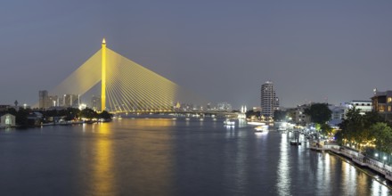 The illuminated Rama VIII Bridge over the Mae Nam Chao Praya, Bangkok, Thailand, Asia