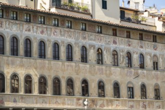 Paintings on a wall of an old building at piazza in Florence, UNESCO World Heritage Site, Tuscany,