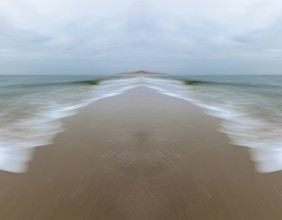 Mirrored picture, blurred, waves on Sylt North Sea beach, National Park Wadden Sea, Sylt, Hoernum,