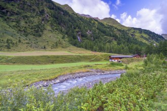 Stream with alpine hut in Dorfertal, Kalser Tauern, Hohe Tauern National Park, Kals am