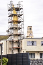 DITIB New Mosque in Duisburg Hüttenheim, new building, minaret under renovation, behind it tower of