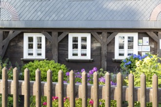 Flowers in front of a half-timbered house, Rammenau, Saxony, Germany, Europe