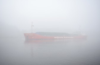 Cargo ship Lady Anneke sailing in fog in the Kiel Canal, NOK, Kielkanal, Kiel Canal,