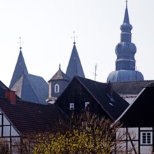 Half-timbered houses and church spires in the historic town centre of Lippstad in spring, North