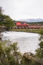 4x4 campervan crossing a bridge near Estancia Harberton, Tierra del Fuego Province, Argentina,