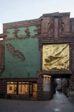 Bremen, entrance to Böttcherstraße, with the façade relief The Lightbringer by Bernhard Hoetger