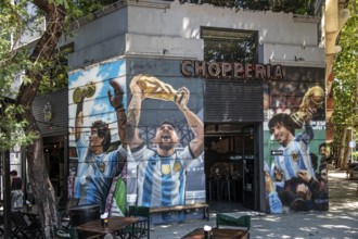 Lionel Messi with World Cup trophy on the wall of a house at El Caminito, La Boca, Buenos Aires,