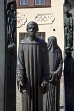 On the market square, 1989 by Klaus Messerschmidt Detail, quotes from Stolberg carved sculpture on