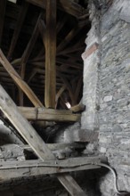 Above the choir vault, wall above the choir arch, remnant of a Romanesque window Church of St.,