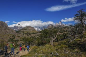 Trekkers at Cascada Martin with a view of the Fitzroy Massif, El Chaltén, Los Glaciares National