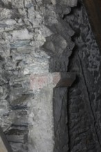 Above the choir vault, wall above the choir arch, remnant of a Romanesque window Church of St.,