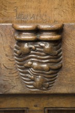 Choir stalls, drolleries on the stall cheeks with proverbial depictions, 1493 by Johannes Gruter