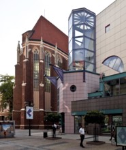 View from the north-east, in front of it the corner tower of the SOLPOL department stores', built