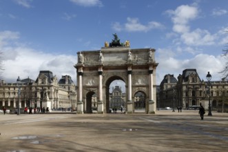 Arc de Triomphe du Carrousel and inner courtyard of the Louvre with pyramid by Ieoh Ming Pei, view