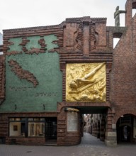 Bremen, entrance to Böttcherstraße, with the façade relief The Lightbringer by Bernhard Hoetger