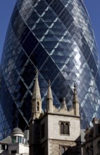 Office tower 180 m by Norman Foster 2001-04, in front of it tower of St Andrew Undershaft Church,