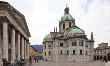 Italy Como left Teatro Sociale 19th century right Cathedral begun in 1396 Continued construction