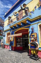 Diego Maradonna, Evita Peron and Carlos Gardel on balcony, El Caminito, La Boca, Buenos Aires,