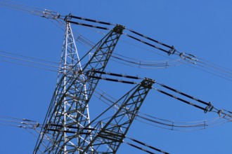 High-voltage line, electricity pylon in front of blue sky, energy supply, power line, electricity,