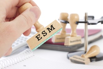 Stamp labelled ESM, euro rescue fund, sovereign default, debt, regulatory framework