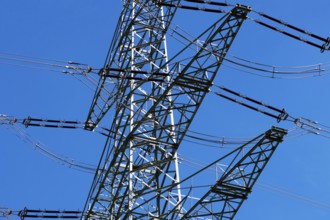 High-voltage line, electricity pylon in front of blue sky, energy supply, power line, electricity,