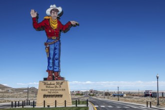 Neon cowboy Wendover Will, landmark of West Wendover, Nevada, USA, North America