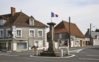 Geographical centre of France, milestone as a marker in the centre of the village