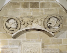 Stone medallions from the tower superstructure, on the right monk with forked tongue, St., Sankt,