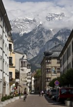 Austrian Hall in Tyrol. Schulgasse with the Karwendel mountains in the background