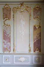 Rococo hall, stucco detail, allegory of the arts