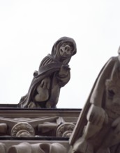 Gargoyle on the tower superstructure, nun with body of bird of prey, St., Sankt, Saint