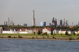 Duisburg, Laar district, residential buildings on the Rhine, behind them industrial plants