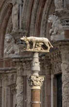 Siena, Duomo Santa Maria, Cathedral Square, detail of the west façade with the Sienese she-wolf in