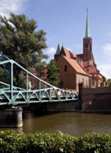 On the bank Peter and Paul Church, 15th century, behind it Holy Cross Church 13-14th century, view