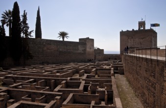 Alcazaba fortress, inner courtyard with Torre de la Vela, building floor plans exposed below