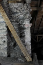 Above the choir vault, wall above the choir arch, remnant of a Romanesque window Church of St.,