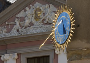 Castle courtyard, sundial and baroque pediment