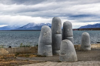 Artwork La Mano, Hand on the shore, Puerto Natales, Patagonia, Chile, South America