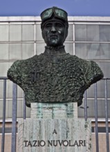 Motorbike and car racer, bust in front of the Palazzo dello Sport