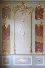 Rococo hall, stucco detail, allegory of the arts