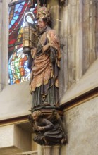 Choir hall, figure of Charlemagne on the eastern end wall with model of the cathedral