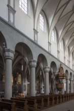 Constance, cathedral, interior, northern nave wall with Romanesque columns and baroque pulpit